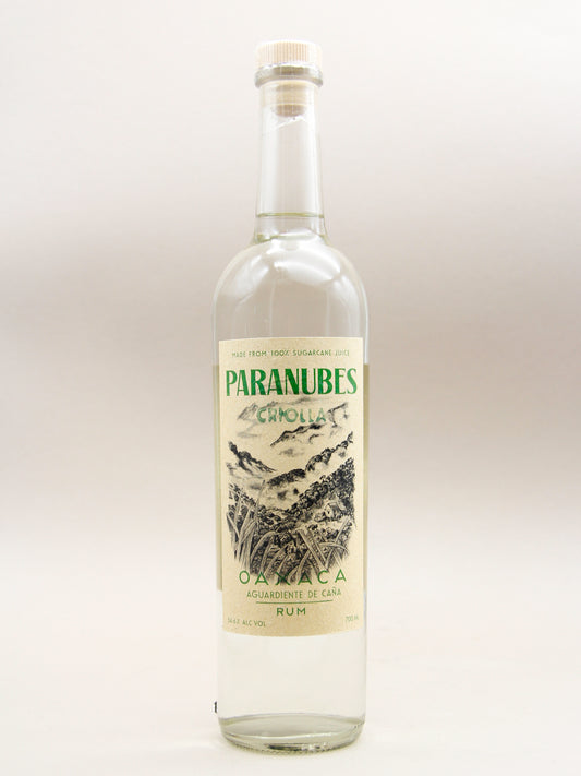 Bottle of Paranubes Single Variety Criolla rum on a greyish background